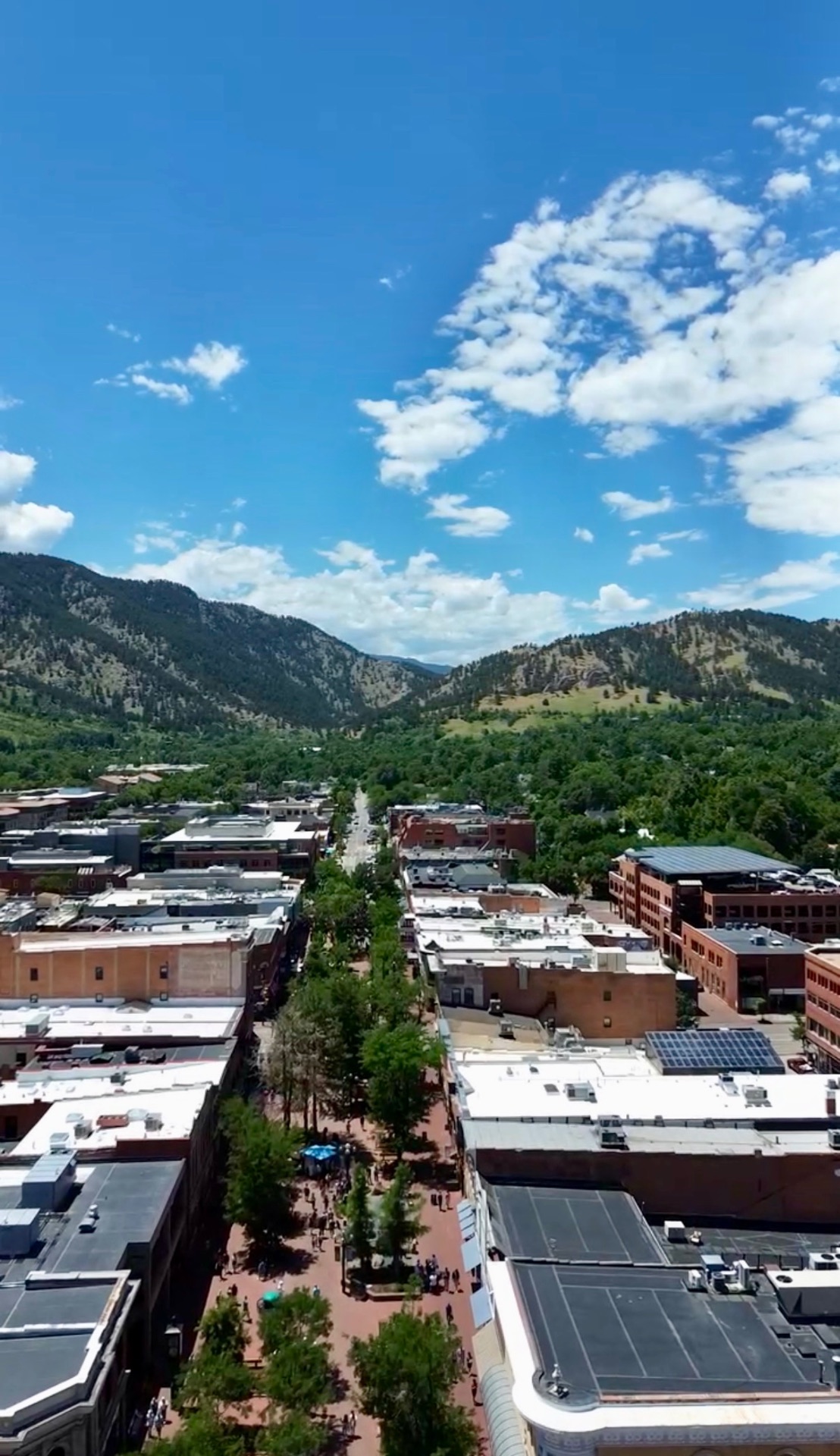 Aerial view of Pearl Street Mall and the Flatirons in Boulder