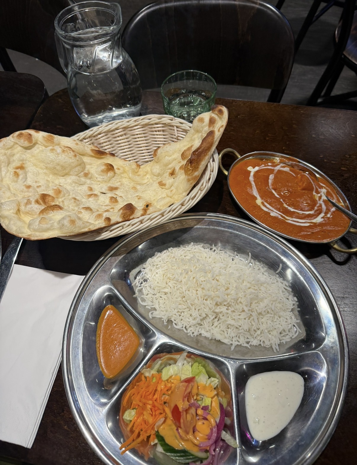 Indian thali with naan, rice, curry and fresh salad at Ravintola Onninenpal in Helsinki